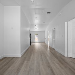 apartment unit with wood floor at at Oaks At Magnolia Apartments located in Tallahassee, FL