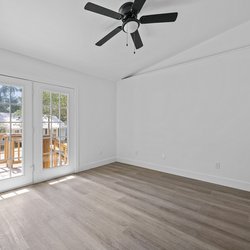 apartment unit with wood floor at at Oaks At Magnolia Apartments located in Tallahassee, FL